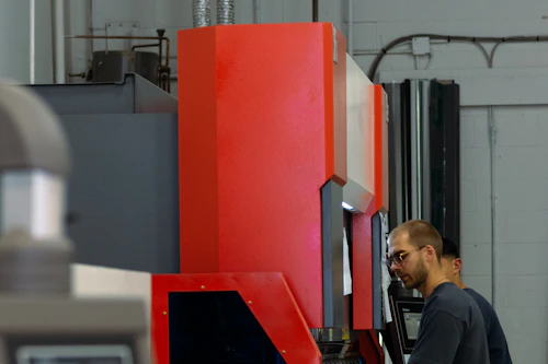 Operator working at a semi-automatic assembly machine